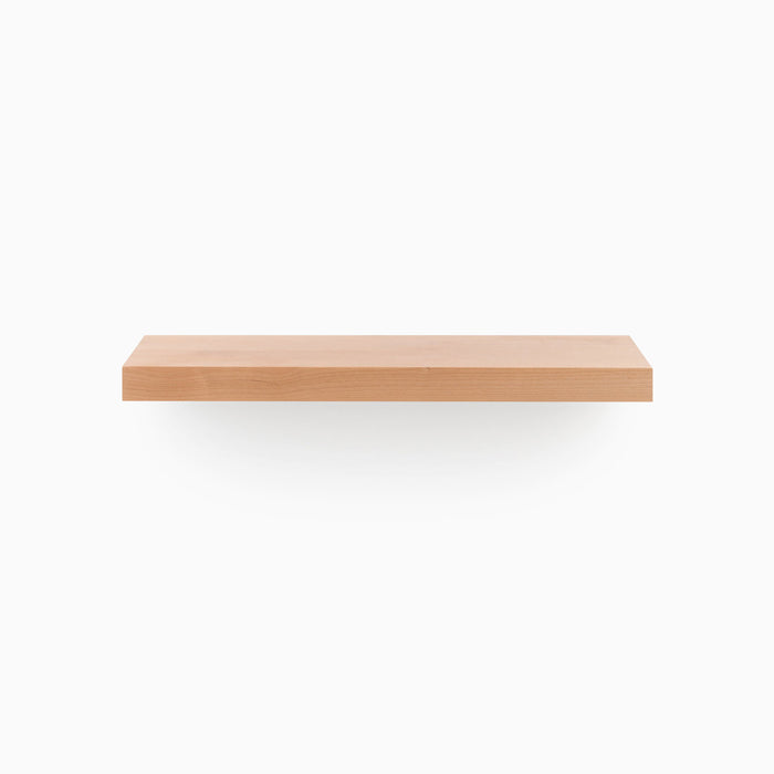 A minimalist wood floating shelf designed for functional wall space organization, the Aksel Alder Floating Shelf by Shelfology.
