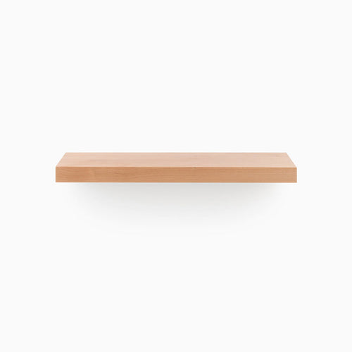 A minimalist wood floating shelf designed for functional wall space organization, the Aksel Alder Floating Shelf by Shelfology.