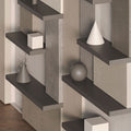 Aksel Arsenic Floating Shelf in minimalist setting displaying geometric decor with wall shelves and metal floating shelf brackets