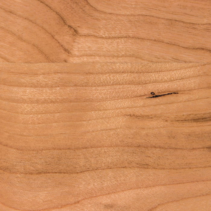 Close-up of wood grain texture on Aksel Cherry Floating Shelf showcasing natural cherry wood details by Shelfology