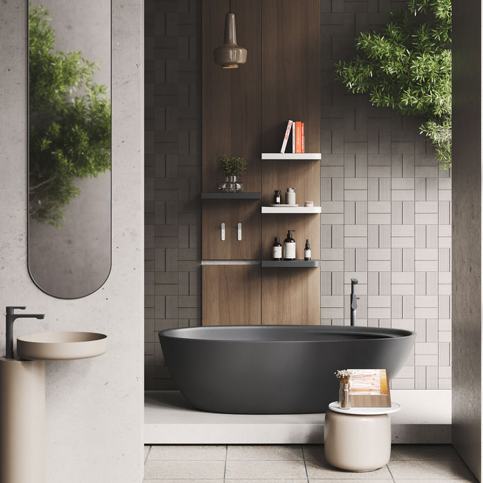 Aksel Cherry Floating Shelf in a modern bathroom displaying toiletries and books on a wooden wall panel with neutral tones.
