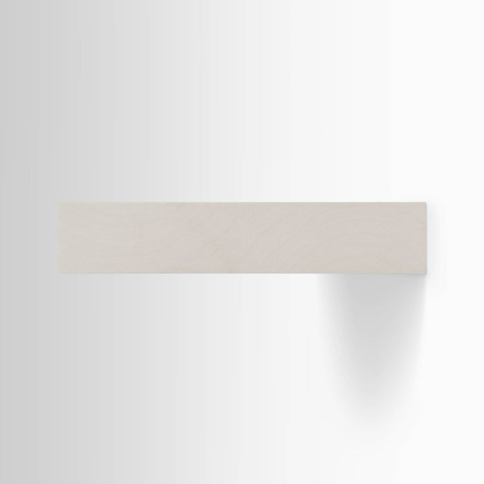 A minimalist Aksel Concretey Floating Shelf in light wood, designed for modern wall display and organization.