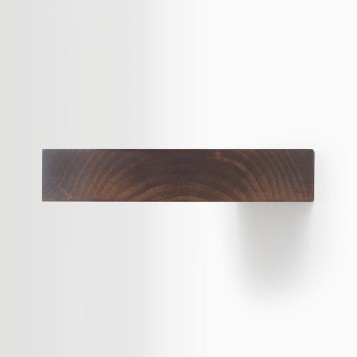 Aksel Espresso Floating Shelf showing minimalist dark wood grain with no visible brackets or hardware on white wall