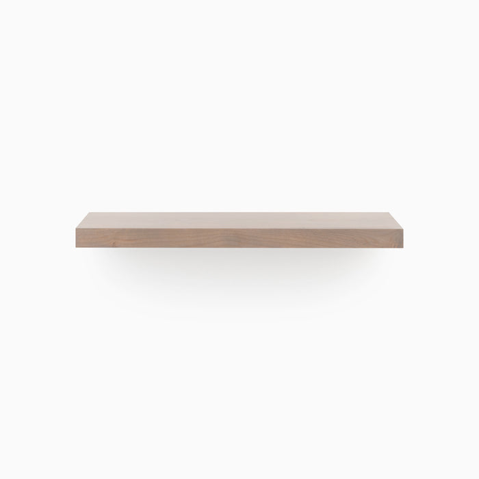 A minimalist Aksel Hatch Grey Floating Shelf with clean lines, perfect for stylish wall display and organization.
