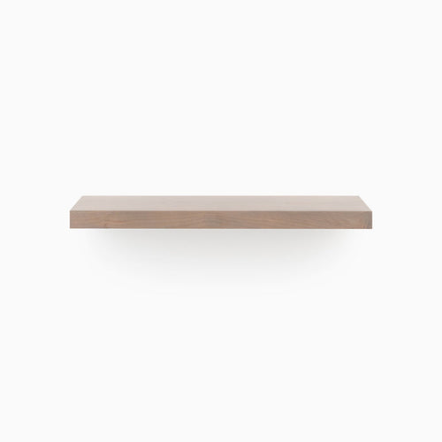 A minimalist Aksel Hatch Grey Floating Shelf with clean lines, perfect for stylish wall display and organization.