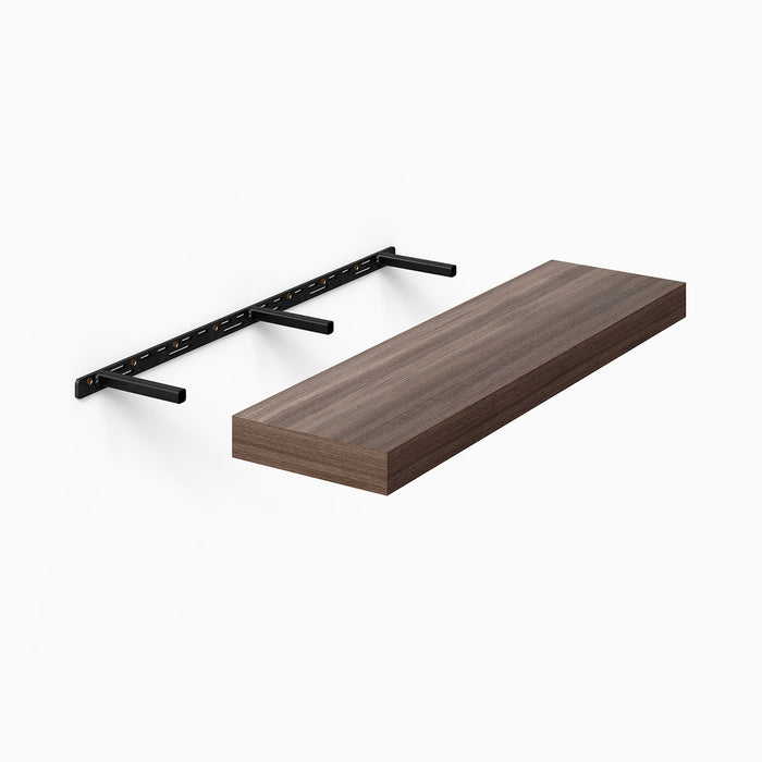 Aksel Hollow Core MD Floating Shelf Bracket in black steel supporting a slim plywood wood floating shelf