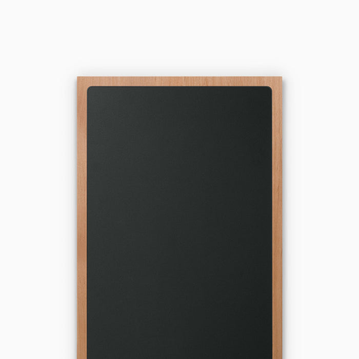 Aksel Inlay Alder Floating Shelf featuring matte black inlay within natural alder wood frame for elegant wall storage and display