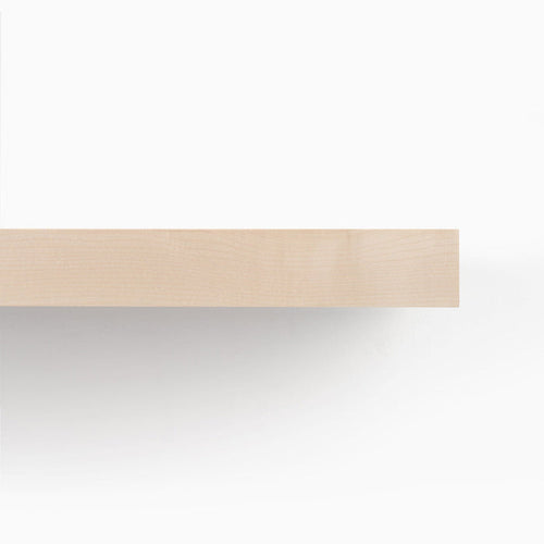 A minimalist Aksel Maple Floating Shelf with natural wood grain, designed for elegant wall shelving and display.