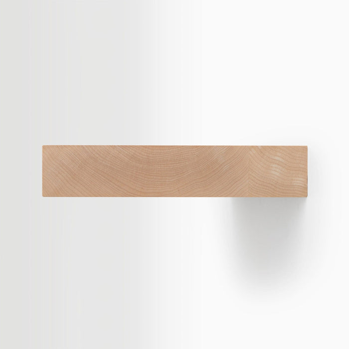 Aksel Maple Floating Shelf made of light natural wood, showcasing minimalist wall shelf design and wood floating shelves.