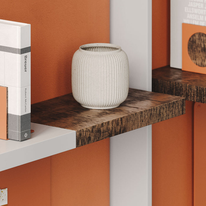 Aksel Nutmeg Rustic Floating Shelf displaying ceramic vase and books on a warm-toned wall for stylish organization