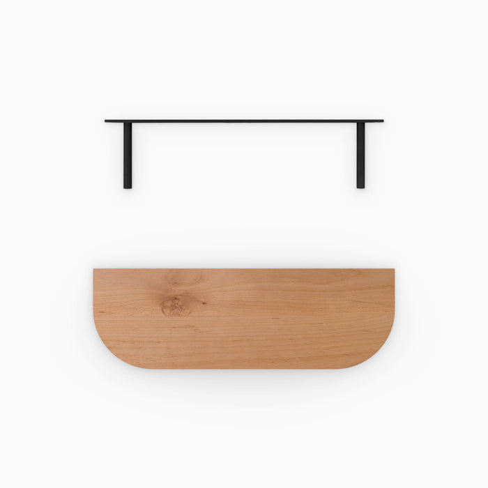 Aksel RADius Alder Floating Shelf in alder finish with smooth rounded edge and black floating shelf brackets by Shelfology