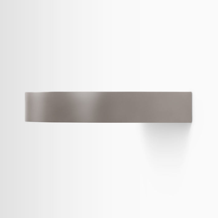 Aksel RADius Arsenic Floating Shelf in muted arsenic finish with smooth curved edge floating on white wall by Shelfology