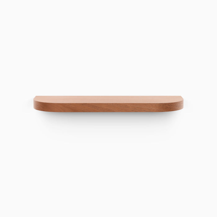 Aksel RADius Cherry Floating Shelf with smooth rounded edges in warm cherry hardwood for minimalist wall display by Shelfology