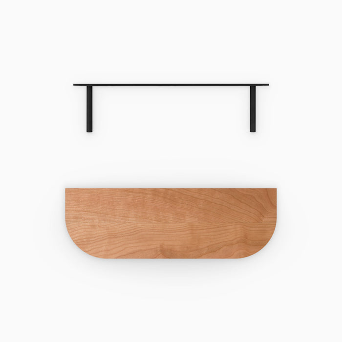 Aksel RADius Cherry Floating Shelf with smooth rounded corners and natural cherry hardwood paired with sleek black metal brackets