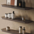 Aksel RADius Walnut Floating Shelf with smooth rounded edges displaying bathroom essentials on warm textured wall
