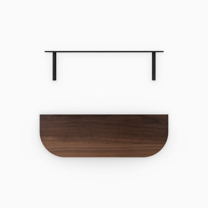 Aksel RADius Walnut Floating Shelf with smooth rounded edges and minimalist black metal floating shelf brackets above