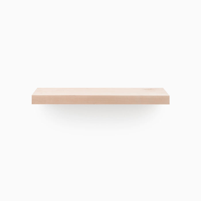 Aksel Unfinished Alder Floating Shelf showcasing minimalist wood floating shelf design by Shelfology for wall display and organization.
