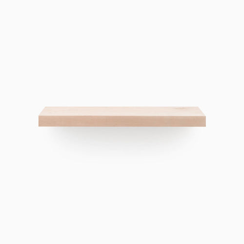 Aksel Unfinished Alder Floating Shelf showcasing minimalist wood floating shelf design by Shelfology for wall display and organization.