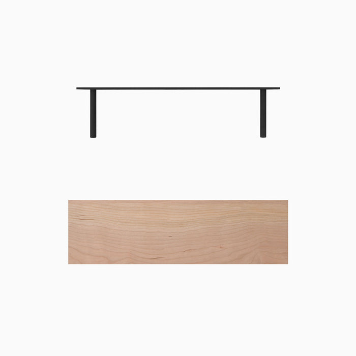 Aksel Unfinished Cherry Floating Shelf showing light cherry wood plank with black floating shelf brackets for wall display and organization