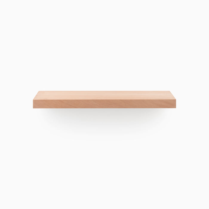A sleek Aksel Unfinished Mahogany Floating wood shelf against white background for stylish wall display and organization.