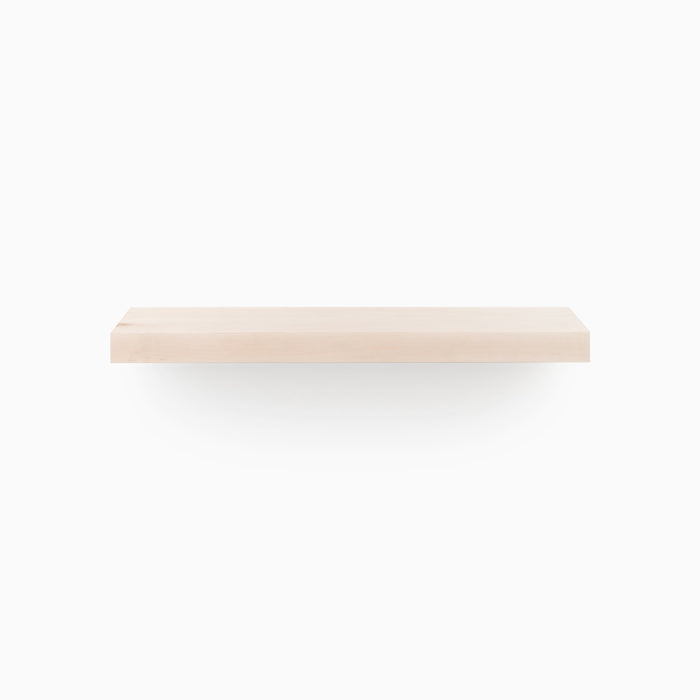 A simple minimalist Aksel Unfinished Maple Floating Shelf wall-mounted for elegant and functional wall display and organization