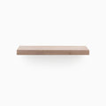 A minimalist Aksel Unfinished Walnut Floating Shelf showcasing wood floating shelves for stylish wall display and organization.