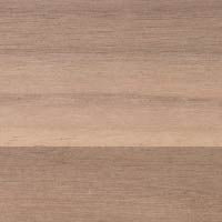 A close-up of Aksel Unfinished Walnut Floating Shelf showcasing natural wood grain and smooth minimalist finish by Shelfology.