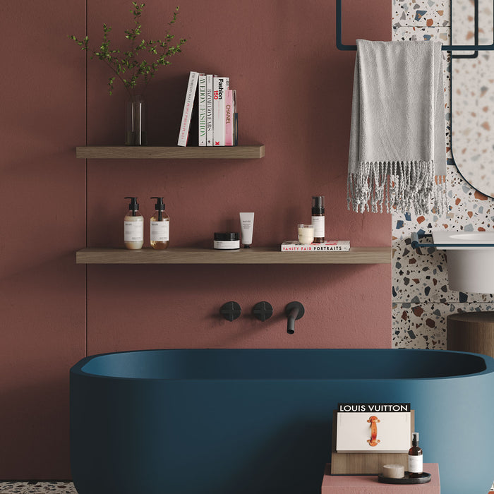 Aksel Walnut Floating Shelf mounted on a wall organizing bathroom essentials in a minimalist, stylish setup.