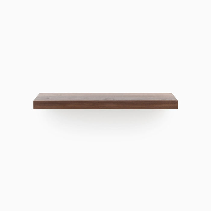 Aksel walnut floating shelf crafted from solid wood with a sleek, minimalist profile, front view