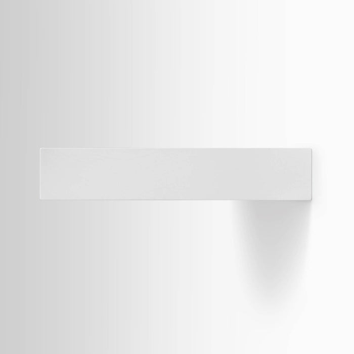 A minimalist Aksel White Floating Shelf mounted on wall, showcasing functional, clean-lined wall shelf design by Shelfology.