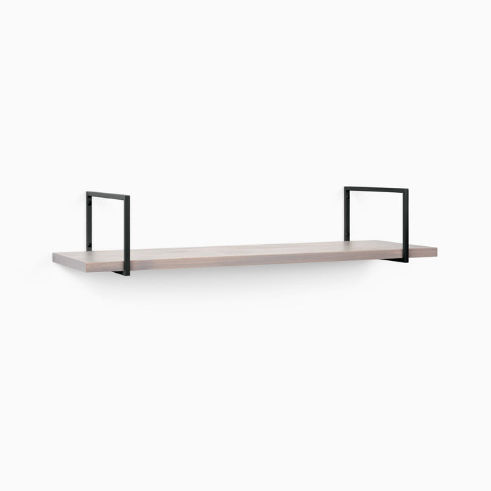 Bart Hatch Grey Wall Shelf with smooth grey wood and modern black metal floating shelf brackets for stylish display