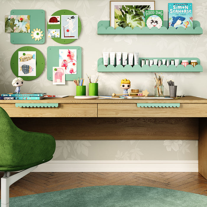 Bubble Cabinet Pull in soft green with playful curved design enhancing functional organization and display spaces