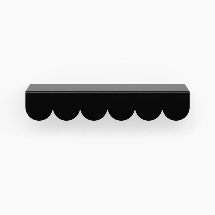 Bubble Cabinet Pull in black matte finish with scalloped rounded edges for stylish and durable cabinet hardware.