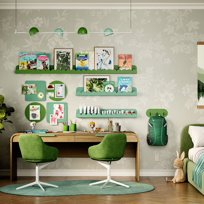 Bubble Picture Ledge in playful green steel with scalloped edges displaying books and artwork above wood desk in kids’ room