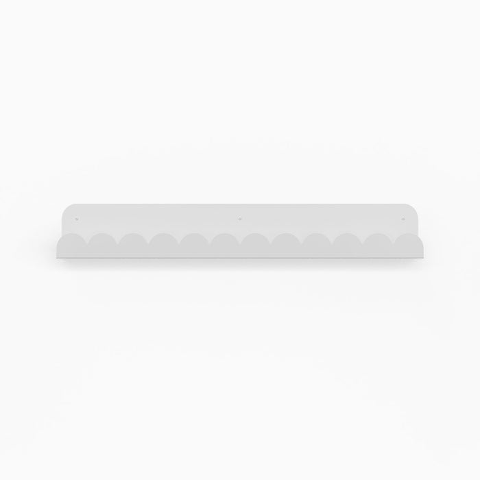 Bubble Picture Ledge in white matte steel with scalloped edge designed for playful shelf and wall display organization
