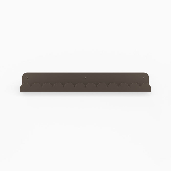 Bubble Picture Ledge in tungsten steel with scalloped edge offering durable, playful floating shelf for wall display and organization