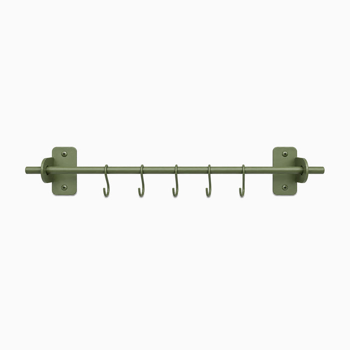 Etta Utensil Rack in muted green metal with six hooks, designed for functional wall organization and durable, rust-resistant use.