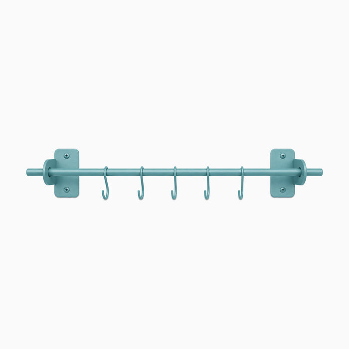 Etta Utensil Rack in matte teal finish with six hooks, designed to maximize wall space and organize kitchen tools efficiently.