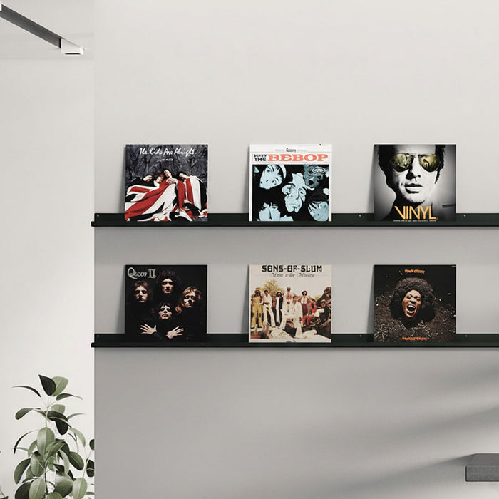 Fat Lippie Picture Ledge (7" Depth) in matte black steel floating shelves displaying vinyl record covers on a light wall