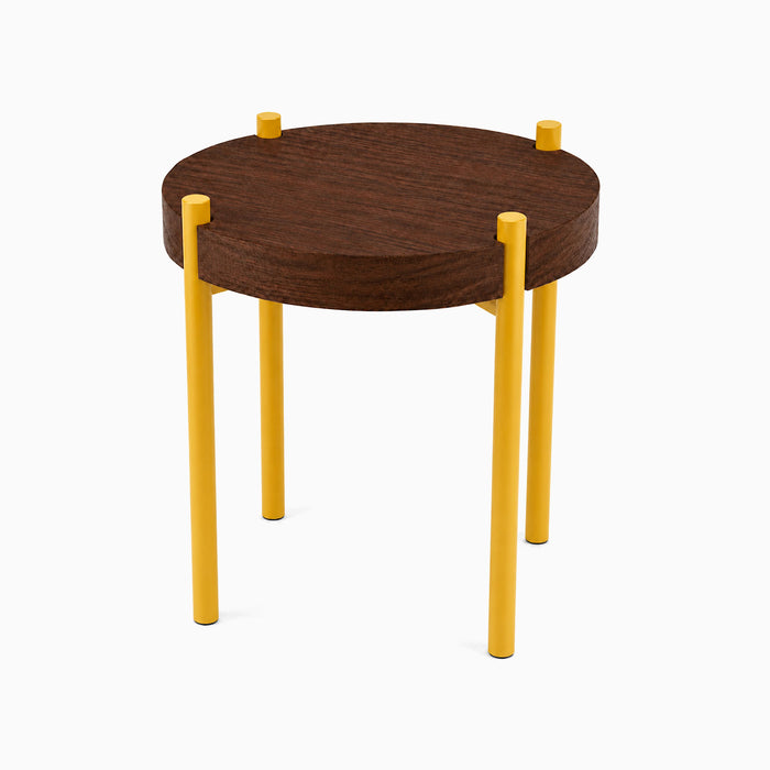Fern Plant Stand (Walnut) featuring a round solid walnut top supported by four sturdy yellow metal legs, designed for stylish plant display.