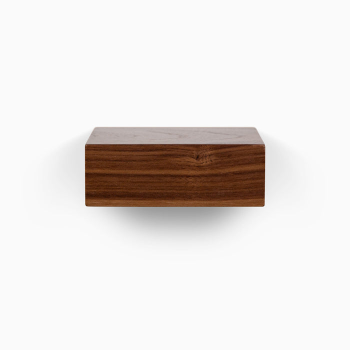 Small square floating wall shelf in solid walnut
