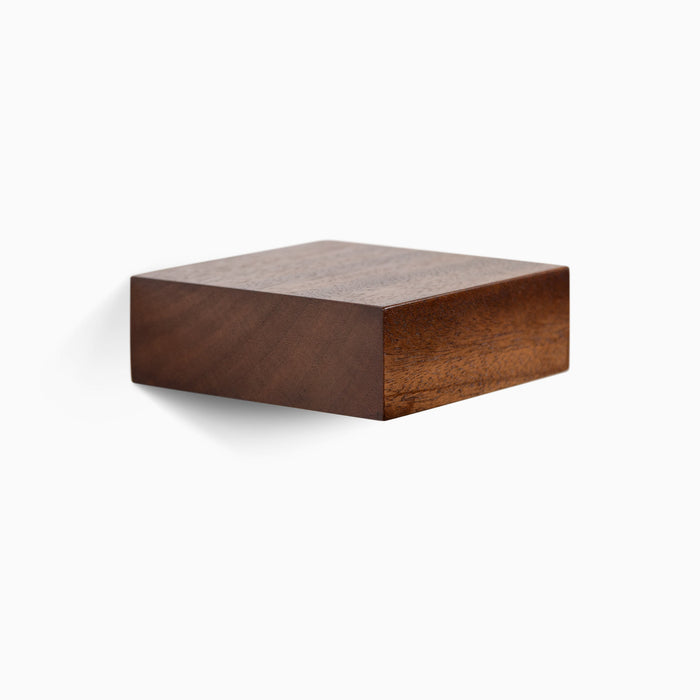 Small floating wall shelf in walnut hardwood