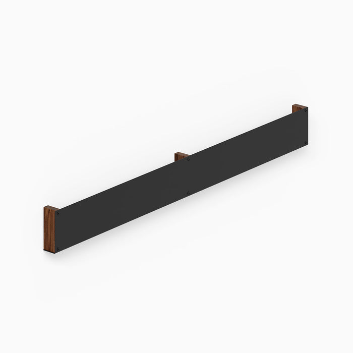 Folio Art Book Display featuring a minimalist black metal panel with walnut wood ends designed for stylish wall-mounted organization.