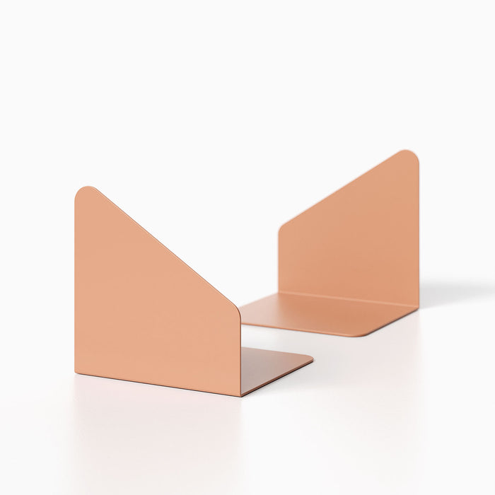Geo Angle Bookend (Set of Two) in a minimalist matte peach finish designed for functional, space-maximizing organization on shelves or desks.