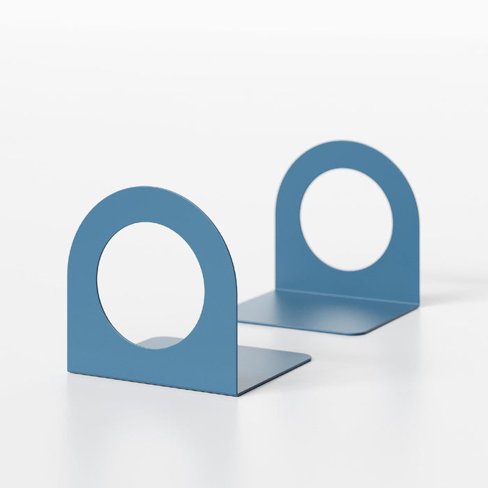 Geo Round Open Bookends (Set of Two) — 7" x 5" x 5 1/2" — Clearance, blue metal with circular cutout for sleek minimalist shelf and wall display organization.