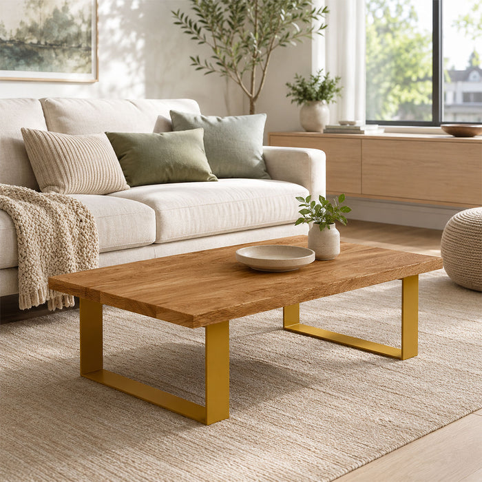 Minimalist living room featuring a wooden coffee table with gold metal Good Point Coffee Table Legs (Two Legs) on a neutral rug, complementing soft beige sofa and green throw pillows.
