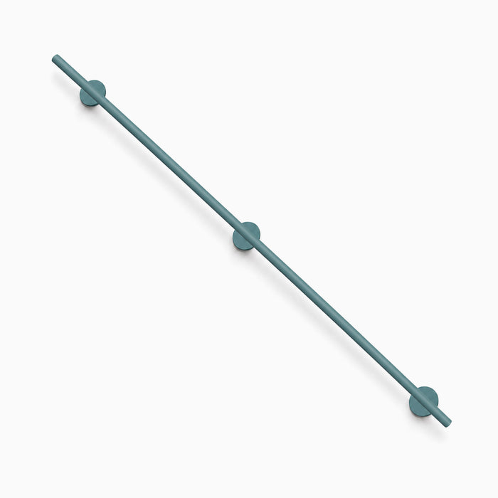 Grip Stair Rail in matte teal finish with three round wall mounts, designed for minimalist and durable American-made organization solutions.