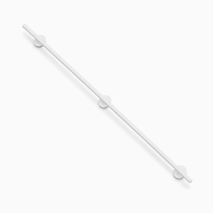 Grip Stair Rail in sleek white finish made from durable rust-resistant steel, designed to maximize wall space and enhance safety with minimalist style.