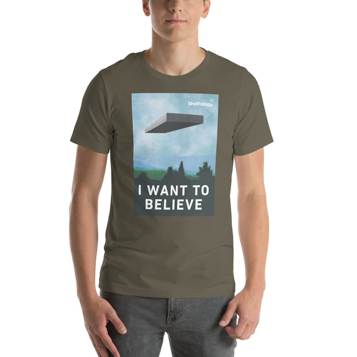 I Want to Believe T-shirt in army green featuring floating shelf graphic with bold white text for minimalist style
