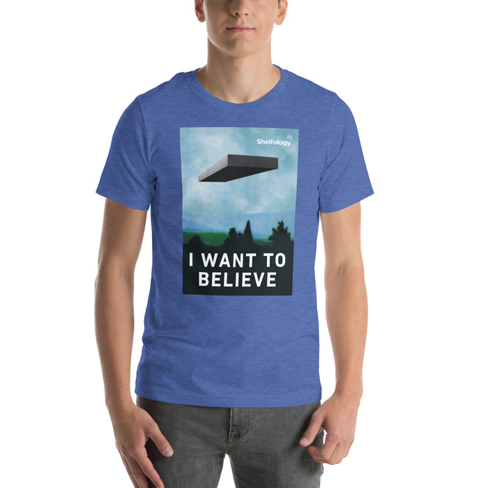I Want to Believe T-shirt in heather blue with graphic of floating shelf and bold white text for casual minimalist style
